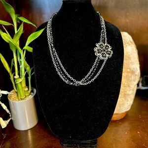 Unique silver and black flower necklace